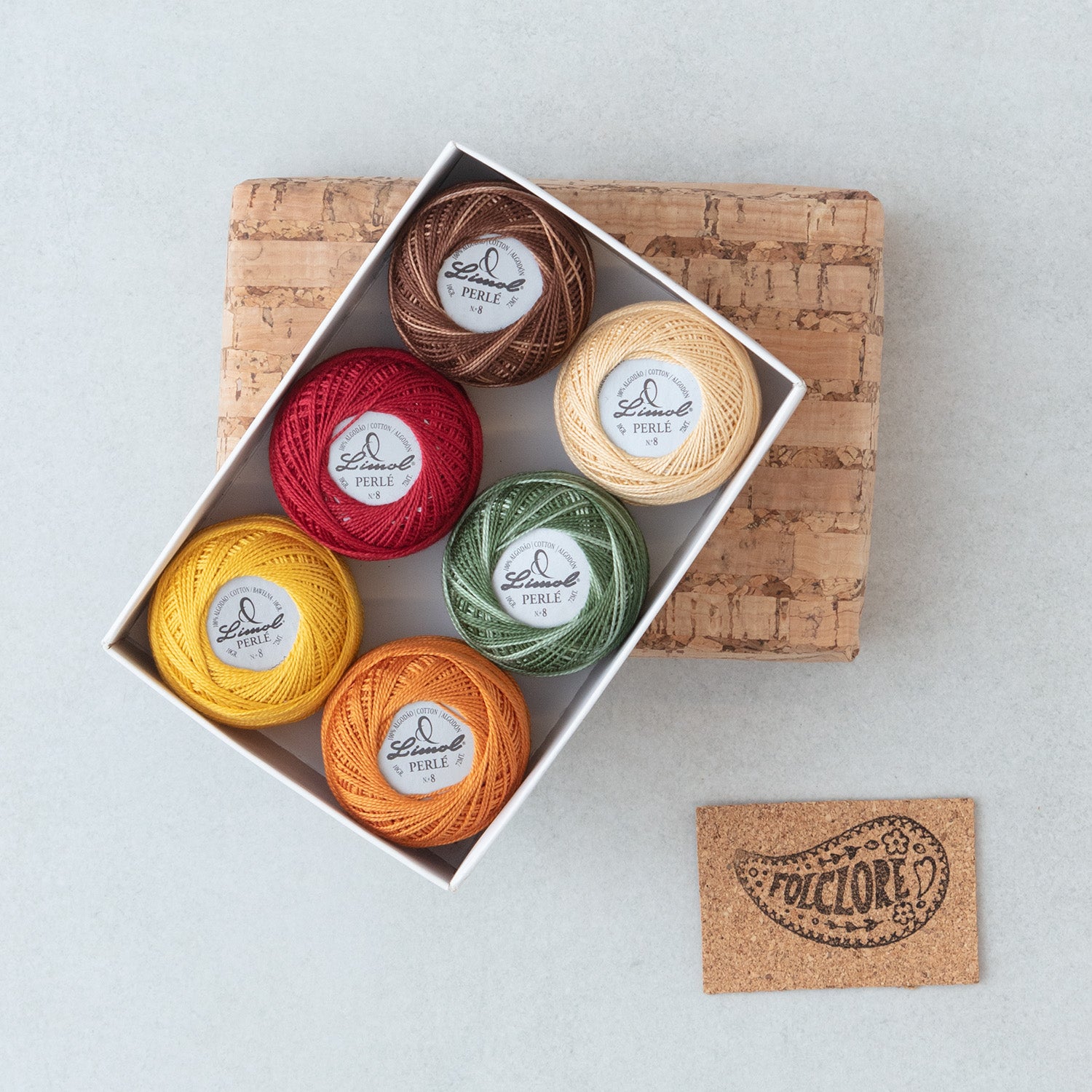 Limol perle cotton balls in a cork box – Fall colours